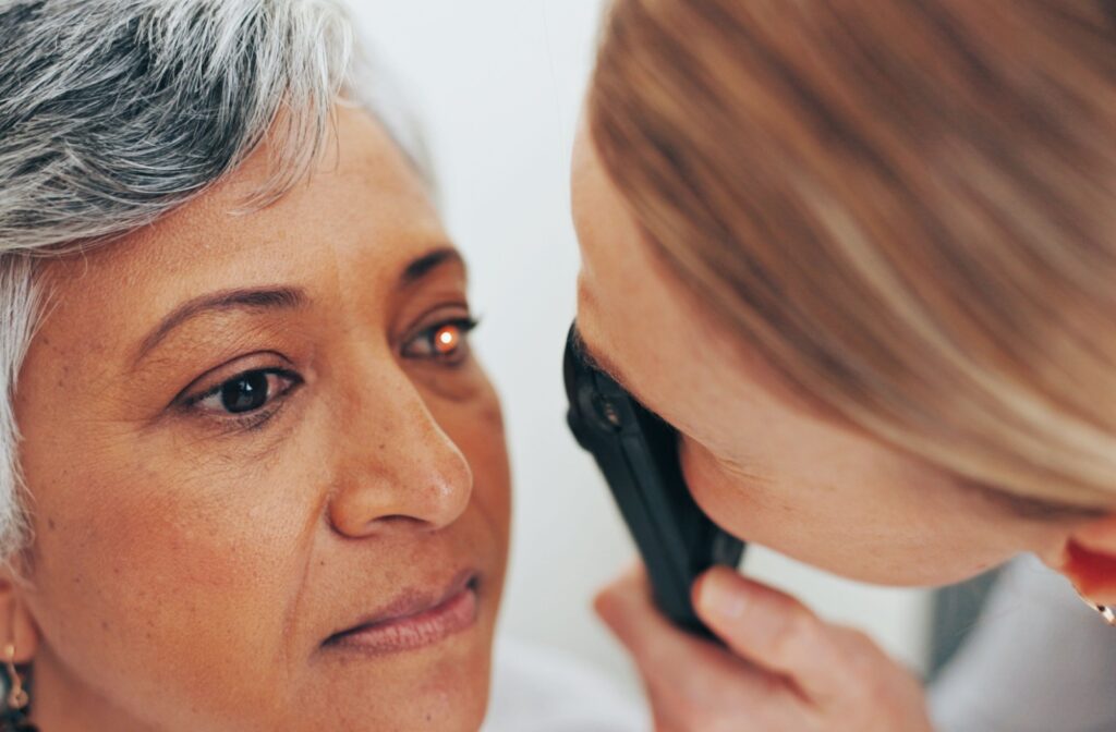 An eye doctor examining seniors eyes for glaucoma