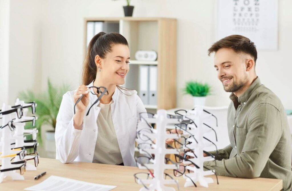 a person looking at different glasses for eye strain
